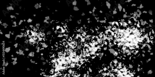 Snowflakes on dark background. white icy snowflakes isolated on black background, natural background. white crystalline powder on a black background. sugar dust. texture, pattern and clipping.