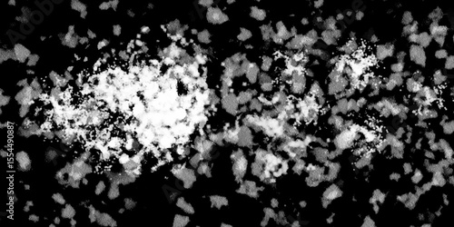 Snowflakes on dark background. white icy snowflakes isolated on black background, natural background. white crystalline powder on a black background. sugar dust. texture, pattern and clipping.