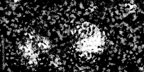 Snowflakes on dark background. white icy snowflakes isolated on black background, natural background. white crystalline powder on a black background. sugar dust. texture, pattern and clipping.