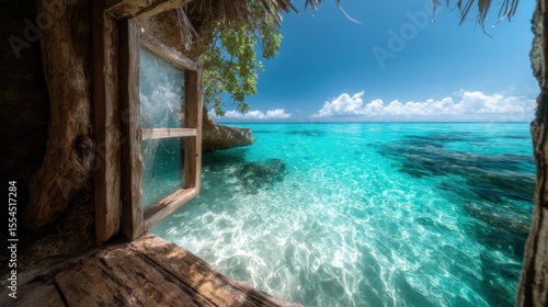 Wallpaper Mural A stunning view of pristine turquoise waters visible through a rustic wooden window, invoking a sense of peace and inviting imagination of tranquil seaside adventures. Torontodigital.ca