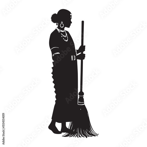 Silhouette of a Woman in an Elegant Dress Holding a Broom

