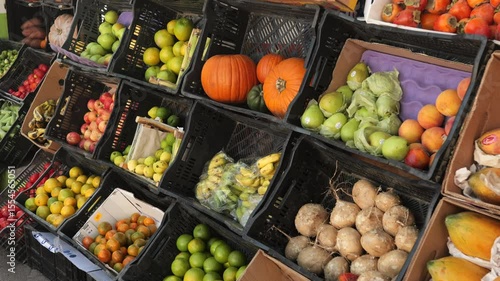 Fruits on display in crates at Mexican food market or Mexican neighborhood shop.