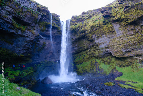 Discover breathtaking Kvernufoss waterfall amidst the lush landscapes of Icelands South Coast