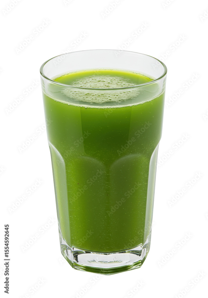 Refreshing green juice in a glass, vibrant color, with foamy top. Isolated on a dark background Refreshing green juice in a glass, vibrant color, with foamy top. Isolated on a dark background