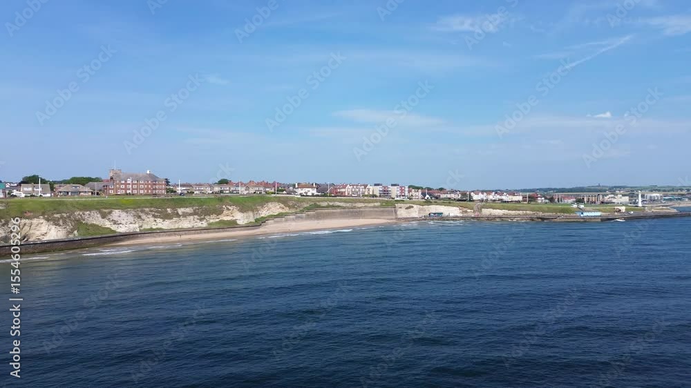 Seaburn coastline and sandy beach on sunny day with blue sky and sea. Sunderland, UK Seaburn coastline and sandy beach on sunny day with blue sky and sea. Sunderland, UK