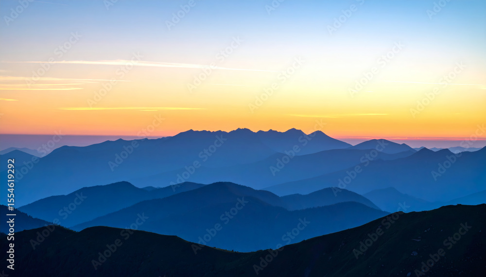 Fototapeta premium Serene Mountain Landscape at Sunrise with Layered Color Gradients