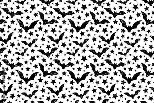 Seamless vector halloween pattern with silhouettes of bats and stars on a white background. Traced