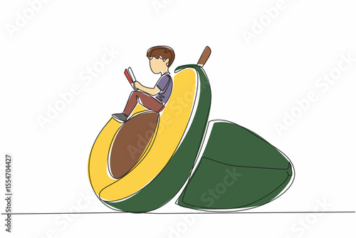 Continuous one line drawing boy reading reading on a cut avocado. Sit back, read seriously. Learn anywhere. Boy Reading Book at Vegetables and Fruits. Single line draw design vector illustration