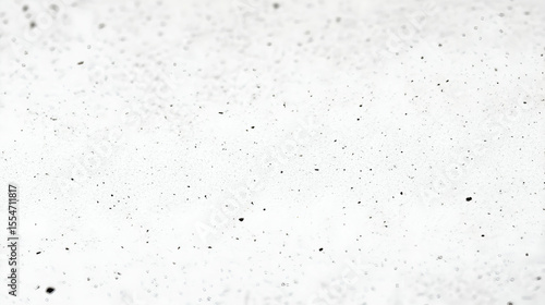 White background with black specks floating dust particles