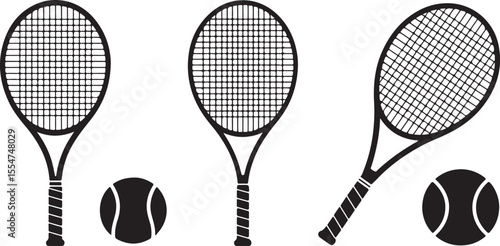 Three black and white tennis rackets and two tennis balls on white background