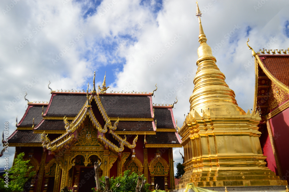 Naklejka premium Pagoda and Chapel, Lanna Architecture, Symbols of Buddhism, South East Asia at Pa Yang temple (Wat San Phra Chao Deang), Ban Thi, Lamphun, Northern Thailand