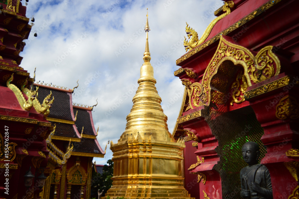 Naklejka premium Pagoda and Chapel, Lanna Architecture, Symbols of Buddhism, South East Asia at Pa Yang temple (Wat San Phra Chao Deang), Ban Thi, Lamphun, Northern Thailand