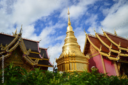 Pagoda and Chapel, Lanna Architecture, Symbols of Buddhism, South East Asia at Pa Yang temple (Wat San Phra Chao Deang), Ban Thi, Lamphun, Northern Thailand
