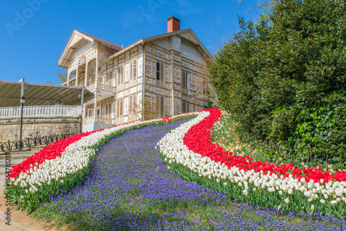 Spring Elegance at Emirgan Grove: Ottoman Pavilion Amid Blooming Tulips