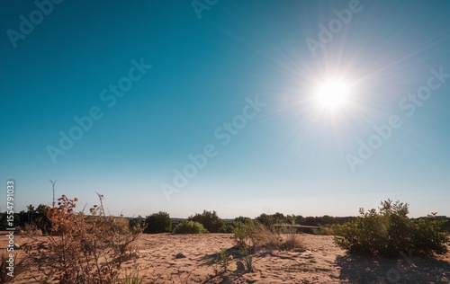 A blue sky with hot sun light