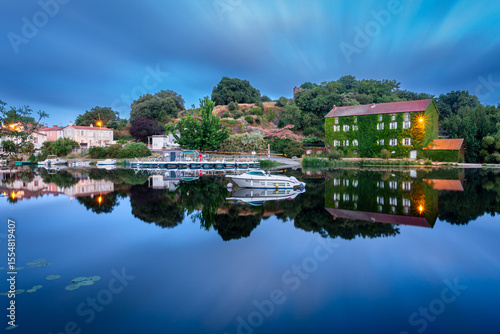 Sunrise with reflection on the river of sevre nantaise in Vertou in Loire-Atlantique, France