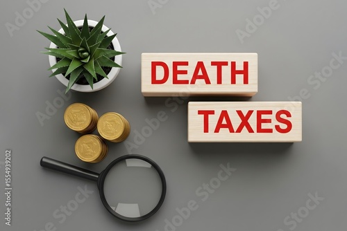 Death taxes concept. Wooden blocks with inscription and coins. Taxes that are applied when someone dies, usually on the money or property they leave behind. 