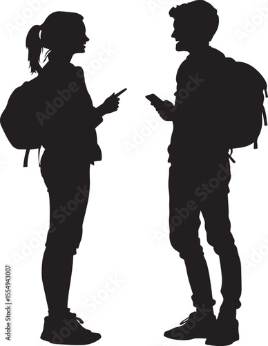 Two or more students chatting and laughing together in a hallway or outdoor space.