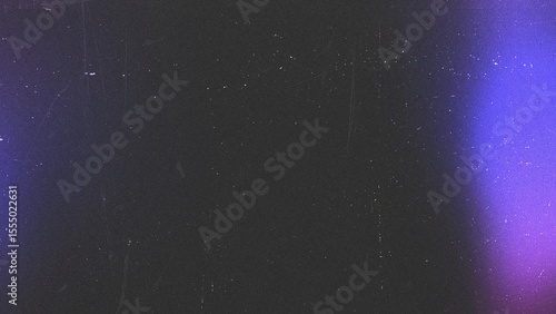 Blue and purple light leaks with a textured black background grunge effect for overlay designs