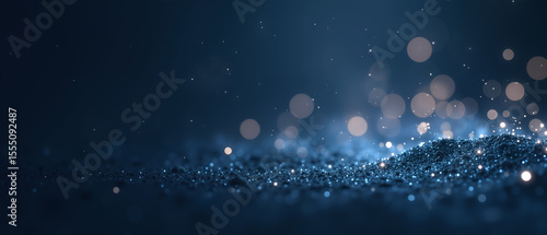 An enchanting dark blue abstract background illuminated by luminous tiny particles softly floating and shimmering, evoking a dreamy cosmic mood ideal for modern high-tech or elegant concepts.