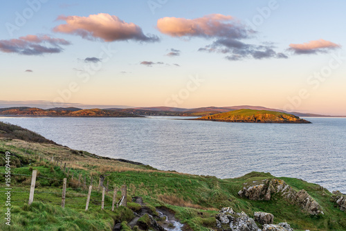 Landscape on the banks of the Dumfries Channel in the evening light near Auchencairn, Scotland, UK