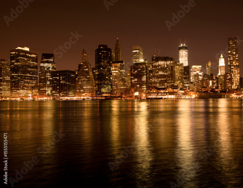 Lower Manhattan at night with a gold filter