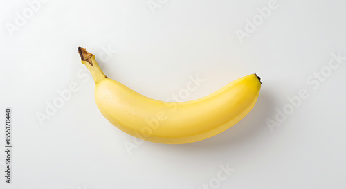 Single Ripe Yellow Banana on White Background Stock Photo