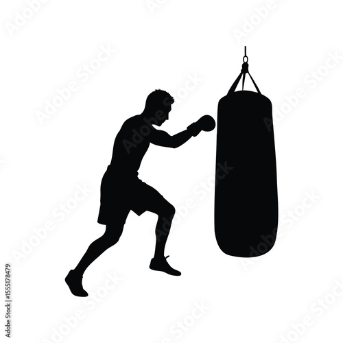 Silhouette of a determined boxer training hard with a punching bag