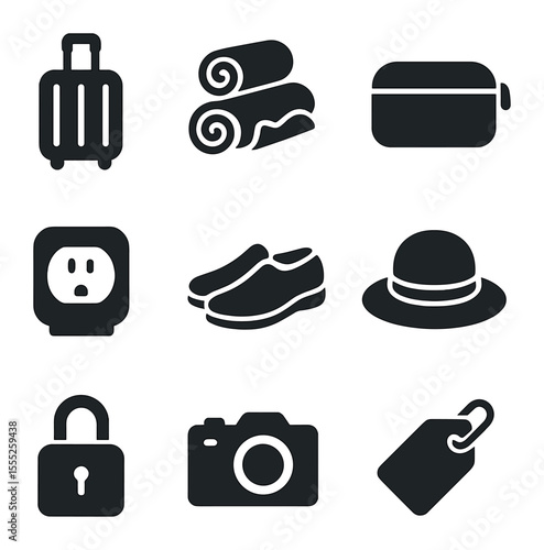 Travel Essentials Icons. Solid, filled icons set of peak season packing: suitcase, rolled clothes, toiletry