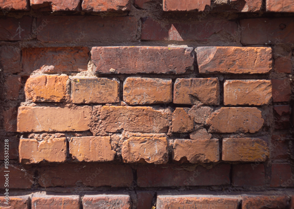 Obraz premium Old weathered brick wall close-up texture