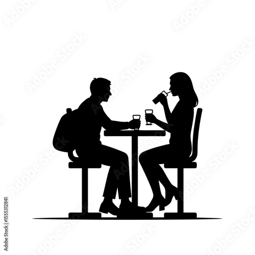 Young man and woman sitting at table enjoying drinks in airport  