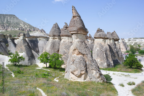 Fototapeta Famous fairy chimneys (volcanic rock formations with distinctive conical caps) i