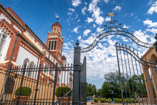 Saint John's Cathedral and the cemetery entrance in Lafayette, Louisiana, United States, a Roman Catholic Church