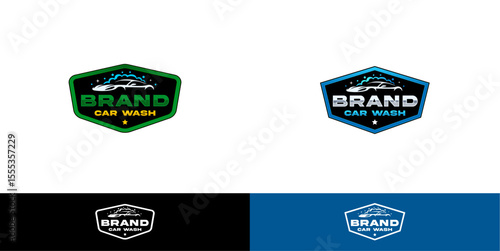 An emblem logo featuring a car shape with soap bubbles, symbolizing cleanliness and professional car wash service.