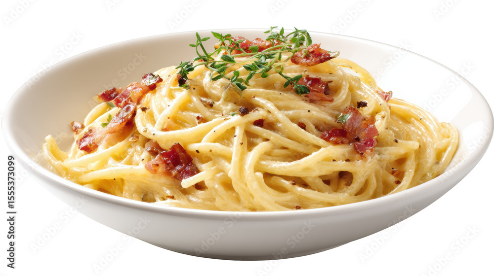 Delicious pasta dish garnished with crispy bacon and herbs on a white plate. Delicious pasta dish garnished with crispy bacon and herbs on a white plate.