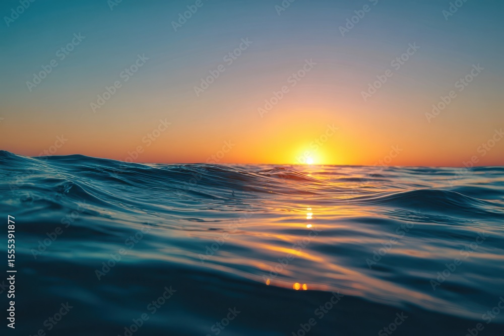Obraz premium Beautiful Ocean Waves at Sunset with Reflection of Golden Sun on Water Surface