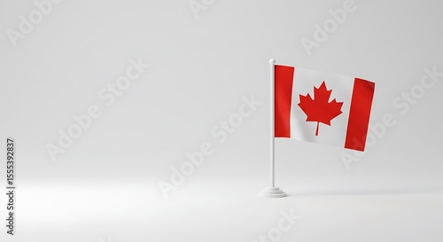 A small Canadian flag waving gently on a white background, simple and clean.