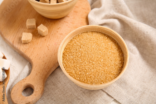 Bowl with brown cane sugar ...
