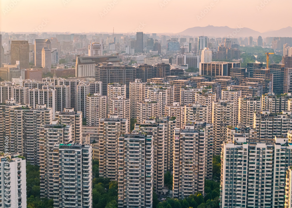 Fototapeta premium Aerial view of urban landscape during sunset. China, Hangzhou.