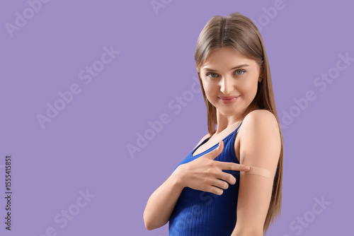 Pretty young woman pointing...