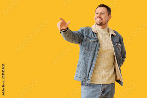 Young man in autumn clothes...
