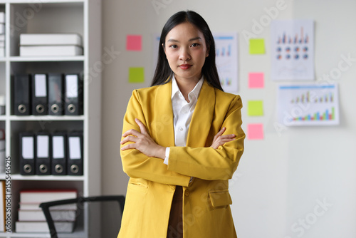 Portrait serious Asian businesswoman in a business office.