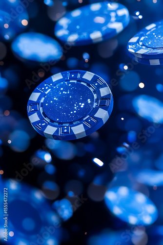 Floating blue poker chips with sparkling details against a blurred dark background, ideal for gaming themes
