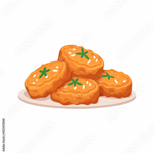 Crispy fried tofu with green star garnish and sesame seeds on a plate