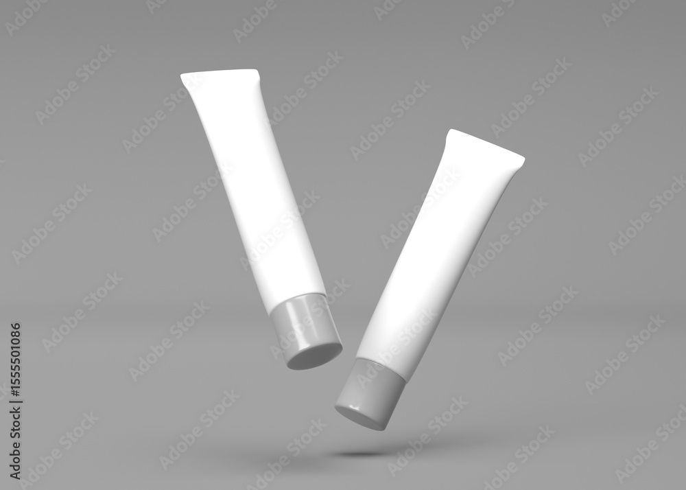 Two Blank White Tubes Falling - Mockup for Cosmetic or Pharmaceutical Products Two Blank White Tubes Falling - Mockup for Cosmetic or Pharmaceutical Products