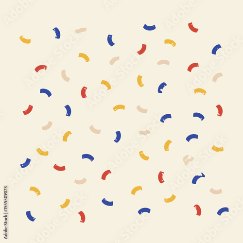 A colorful array of paper shreds, with a light-colored background.