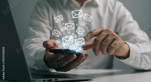 Close up hand touch smartphone with message or email alert sign icon pop up. It can use for Efficient Email Management Mobile & Laptop Integration for Seamless Communication phto concept