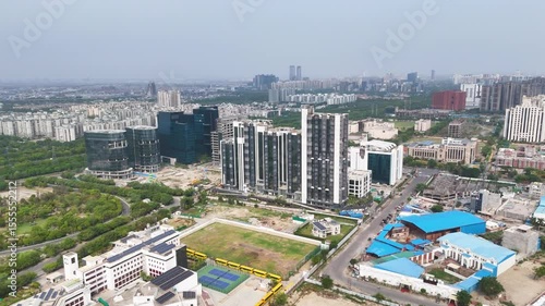 Wallpaper Mural Aerial drone shot of commercial complexes and metro lines in Noida from the sky. Torontodigital.ca