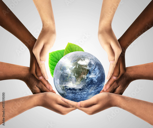 Fototapeta Naklejka Na Ścianę i Meble -  Conceptual symbol of multiracial human hands surrounding the Earth globe. Unity, world peace, humanity concept. World environment day- Earth Day concept. Elements of this image furnished by NASA.