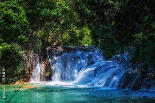 Close up of a cascade of the Agua Azul waterfalls in the rainforest of Chiapas, Palenque, Mexico.